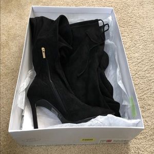 Black thigh high boots